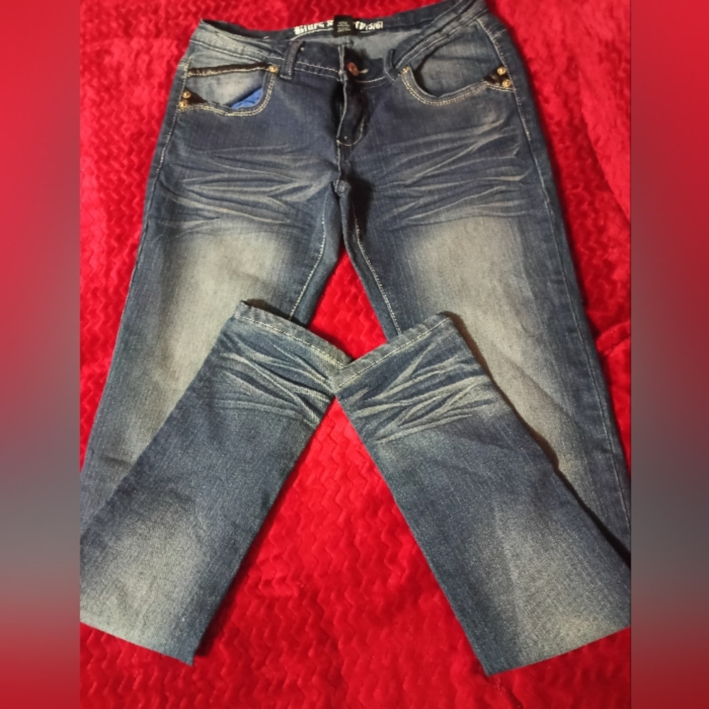 Blue Skinny Jeans with Distressed Details